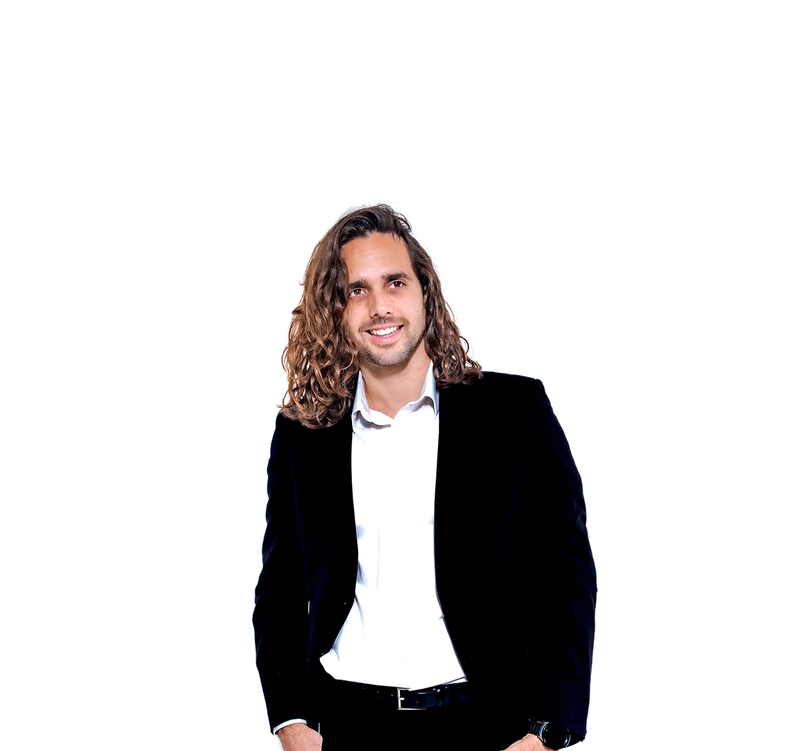 Cesar Caminero in casual business attire